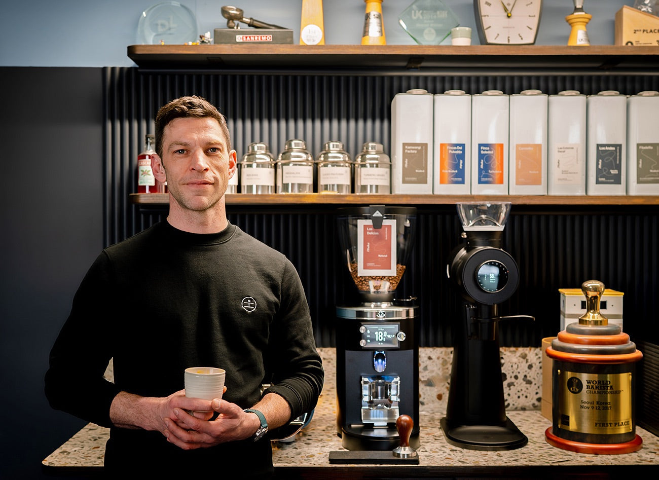 Dale Harris in coffee roastery with GbS grinder