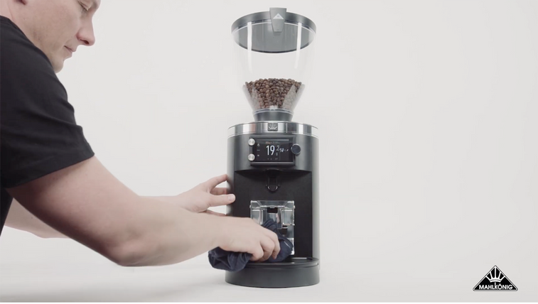 cleaning an espresso coffee grinder